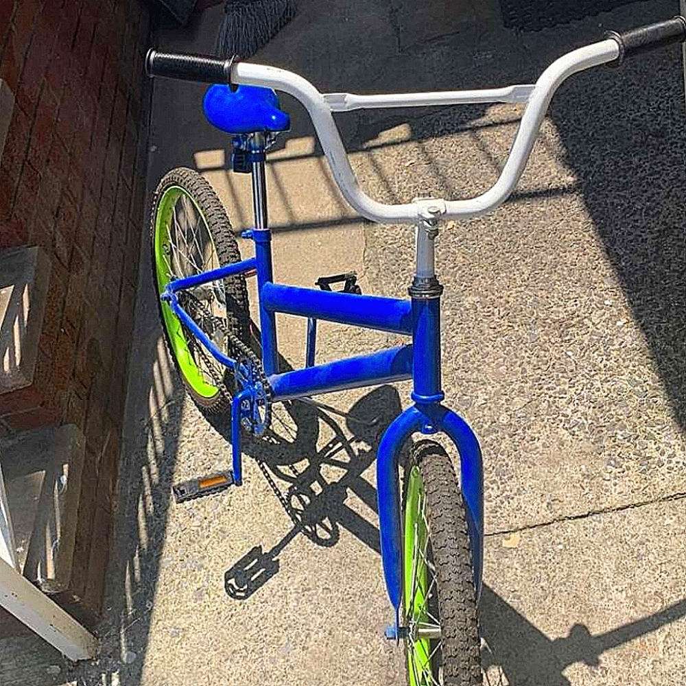 BMX Bike Blue withe green rims white and black